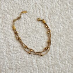 Pulsera dorada trenzada